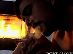 Jock Mason Lear plays with his ass and cock while smoking