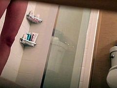 Unaware wife in hotel shower