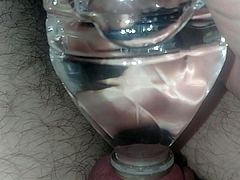 Cumming into a water bottle hands-free via vibrator