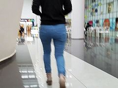 Brunette with nice ass in blue jeans