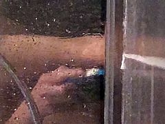 Secretly filmed girlfriend shaving her pussy in the shower