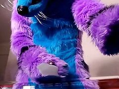 Guy in Murrsuit Paws Off onto a Table