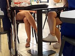 girl sexy crossed legs, feets under table