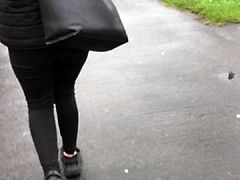 Lotion spray on teen in tight leggings