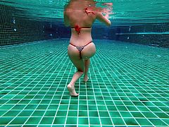 Sexy ass in pool underwater 4k.