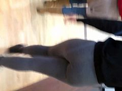 Amazing teen beautiful ass in gray leggings at the store