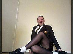 Crossdresser Cosplay in brown schoolgirl uniform