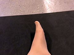 Crossdresser in wet pantyhose at the gym