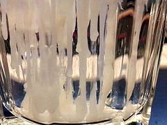 big cumshot in a glass of water