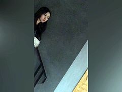 Chinese teen in white dress toilet voyeur