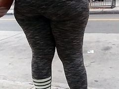 Milf with big ass at bus stop (dancing)