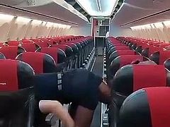 sexy air hostess stretching legs in black tights pantyhose