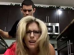 Fucking my horny stepmom doggystyle in the kitchen after she gave me a great blowjob. Now she wants it in her wet pussy.