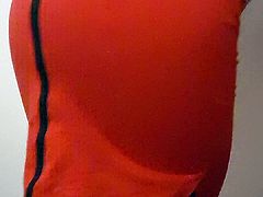 Crossdresser Lea showing off her ass in red tight skirt