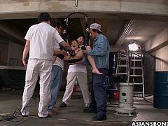 Fresh brunette with tiny tits and perky nipples, Aiko Hirose was caught by a group of men and tied up, so they could play with her trimmed pussy and make her cum.