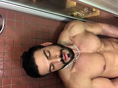 Muscle hunk solo showering