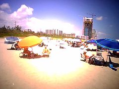 Strolling Through the Sand at Haulover Naturist Beach