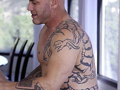 This tattooed bald stud went to his friend's place to hang out with him, but when he reached, he found out that he was not home and his petite daughter was all alone. He went inside to chat with her but ended up seducing the babe and eating her wet lil cunt out, after which he bent her over to rail her in doggy.