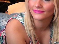 Beautiful blonde with make up posing on webcam