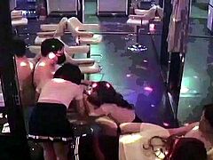 Hot Asian Brothel Girls Take Turns Sucking Cocks